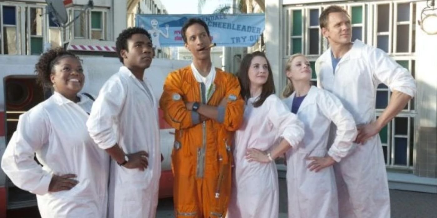 The study group standing confidently in their scientific suits in Community season 2, episode 4, "Basic Rocket Science"
