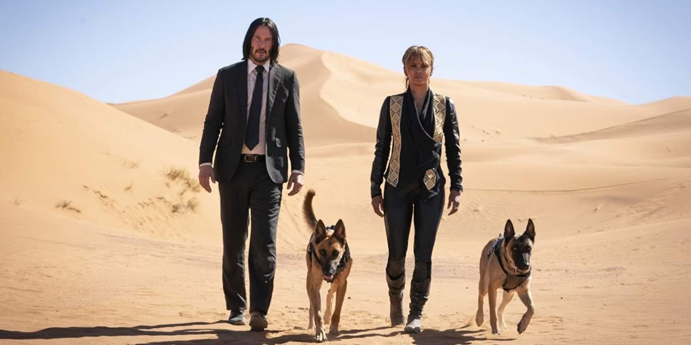 John Wick and Sofia walking with dogs in the desert in John Wick 3
