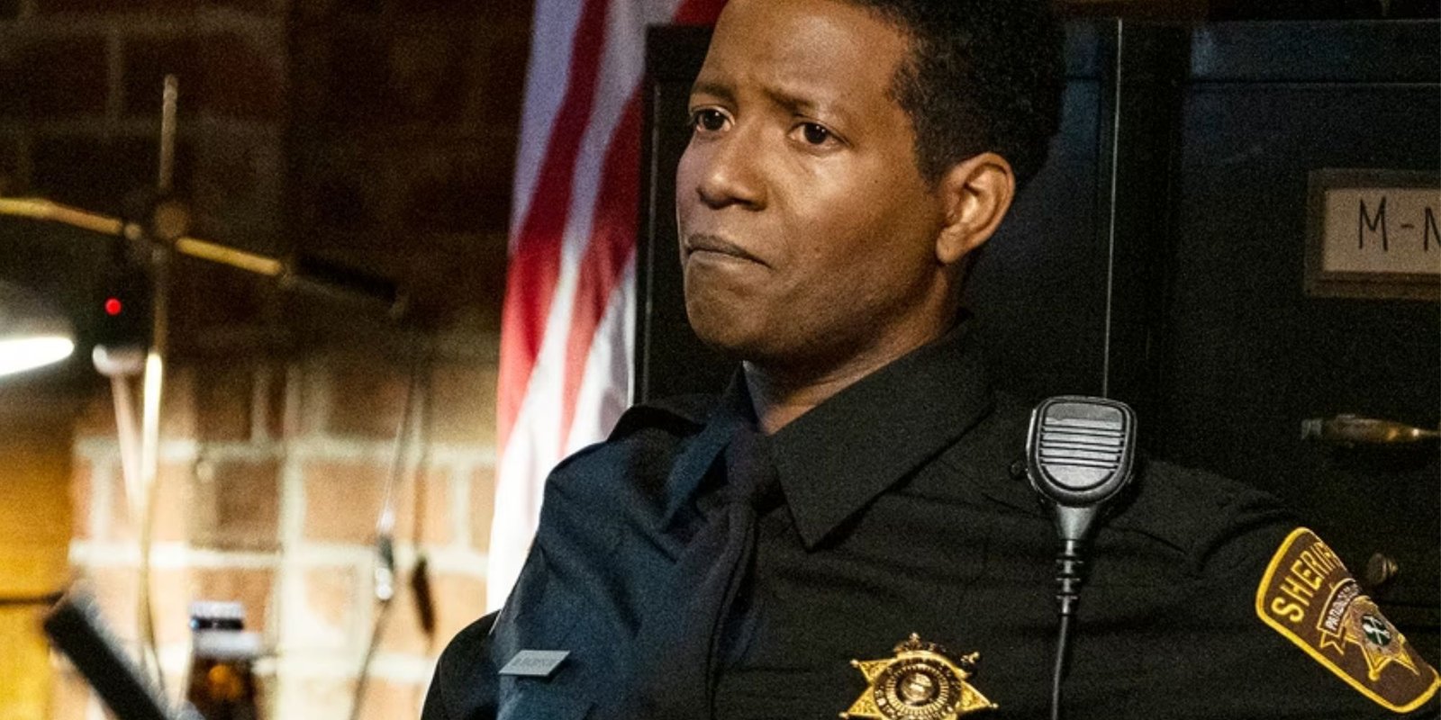 Corey Reynolds as Mike in Resident Alien looking sad