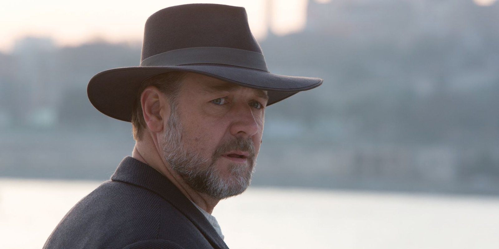 Russell Crowe in The Water Diviner wearing a hat and turned to the side