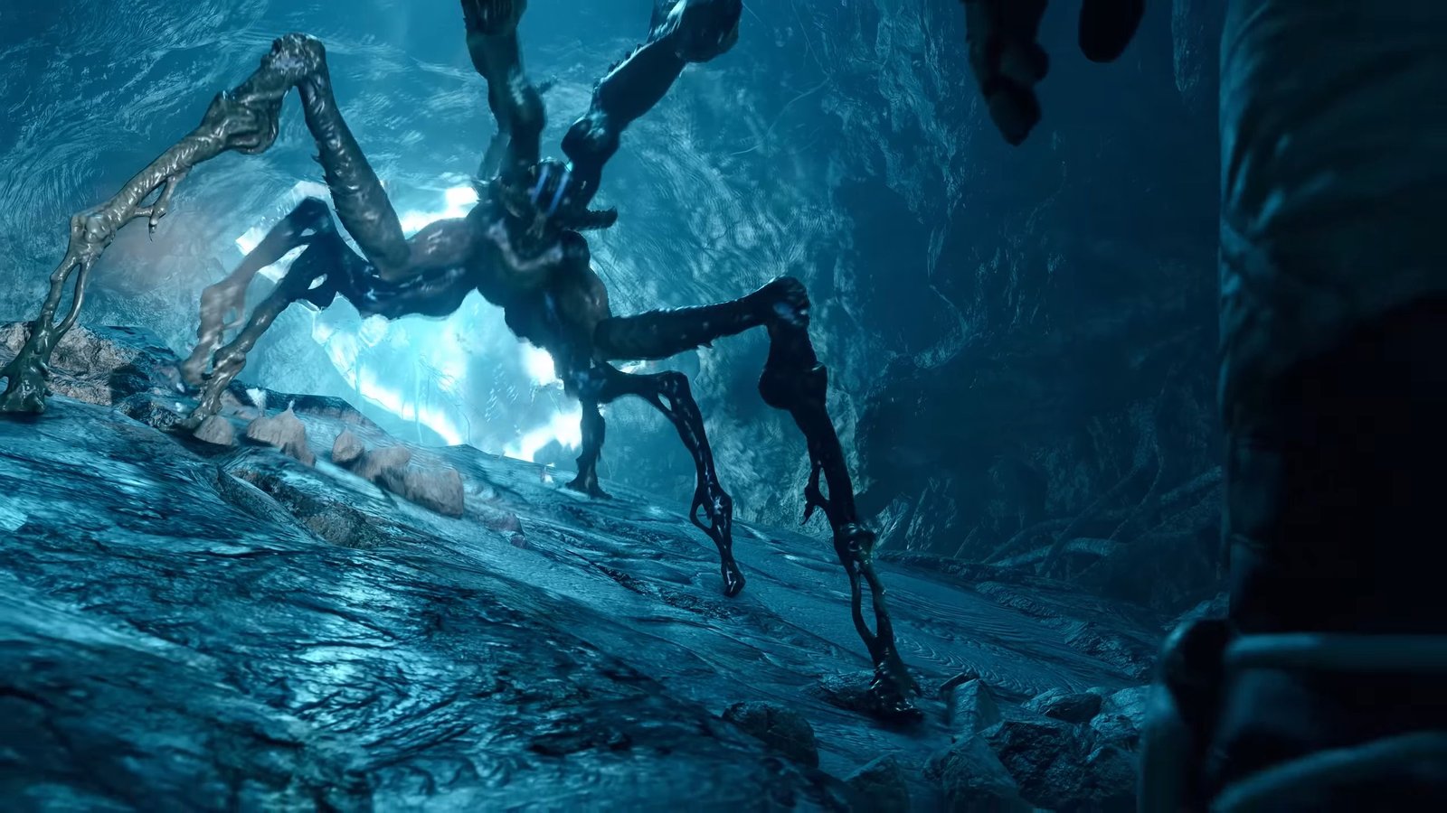 Starfield stick-bug like alien preparing to attack the player in a blue cave.