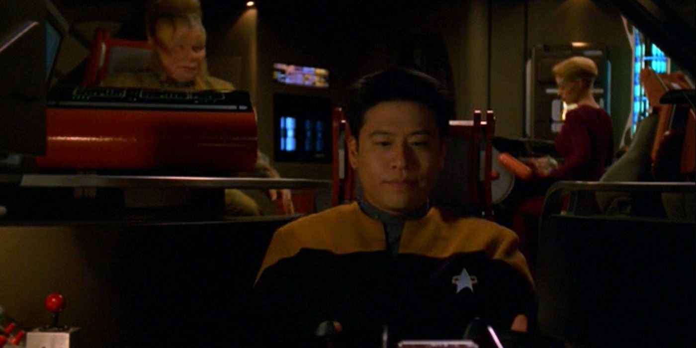 Garrett Wang as Harry Kim leads an away mission in Voyager Nightingale