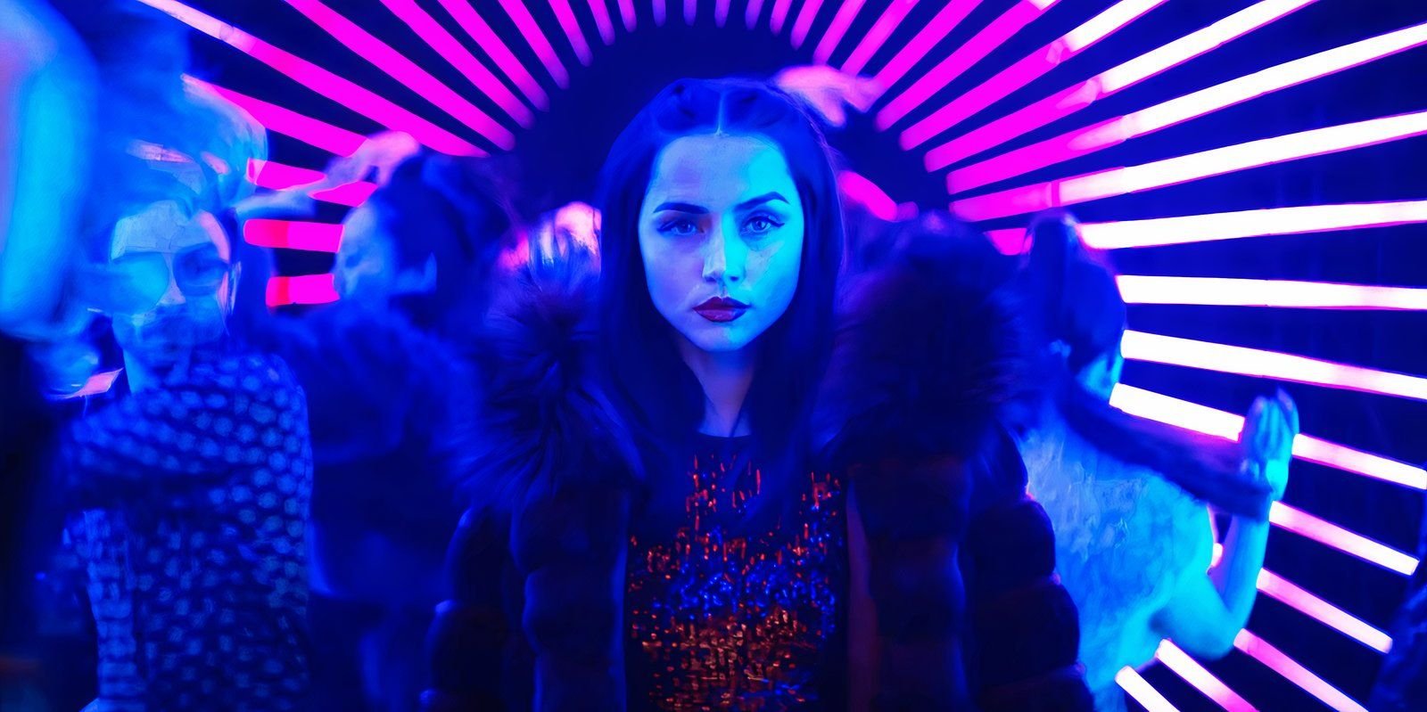 Ana de Armas as Eve walking through a nightclub in Ballerina
