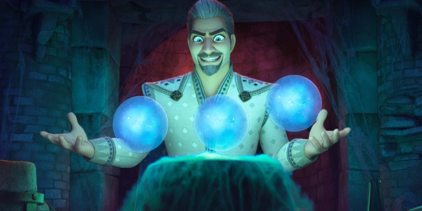 Official List Of Every Single Disney Villain, Ranked 9 King Magnifico in Wish is smiling menacingly with three magical balls in front of him.