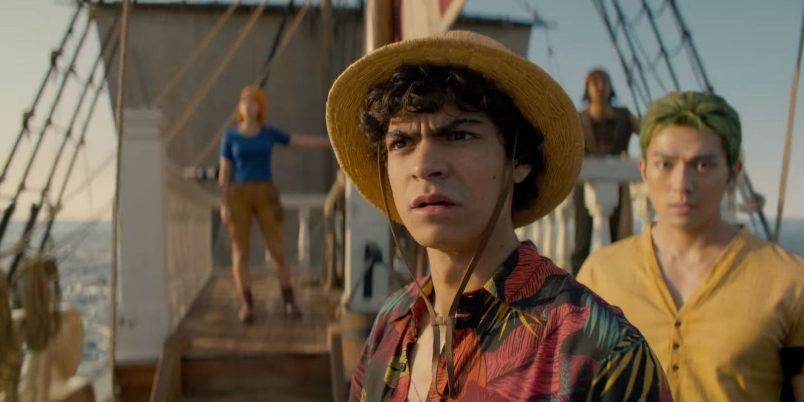 Inaki Godoy as Monkey D. Luffy looking confused on the deck in One Piece.