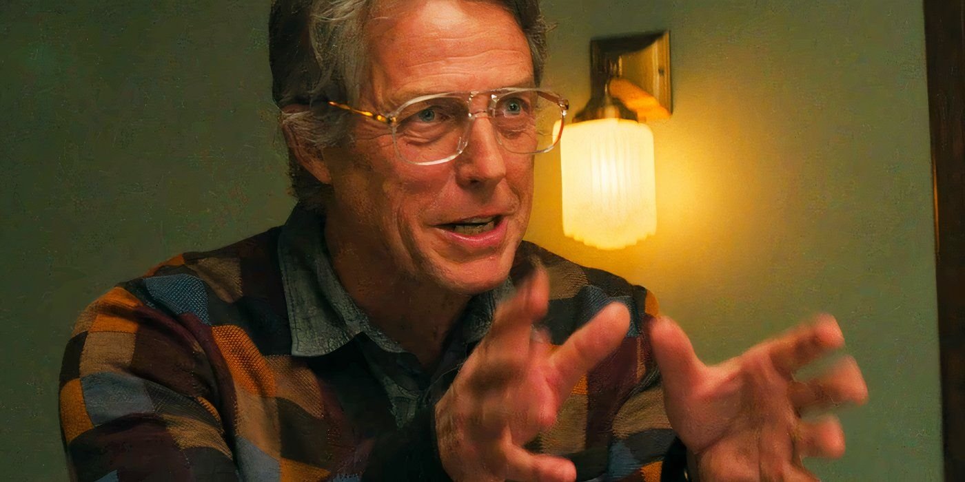 Hugh Grant reaching out his hands in Heretic