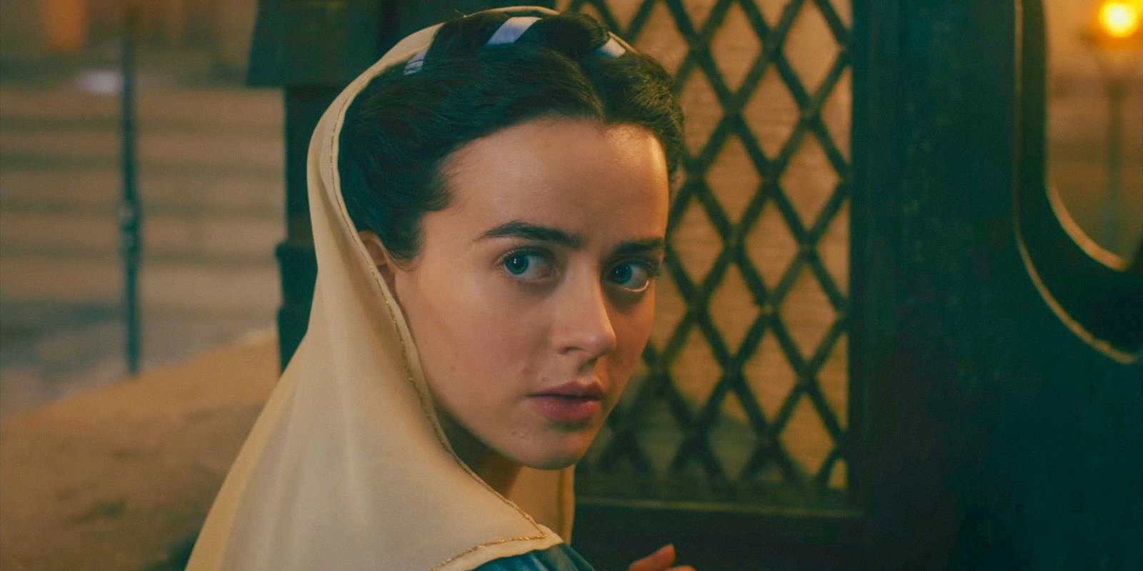 Neifile (Lou Gala) looking over her shoulder in The Decameron Season 1