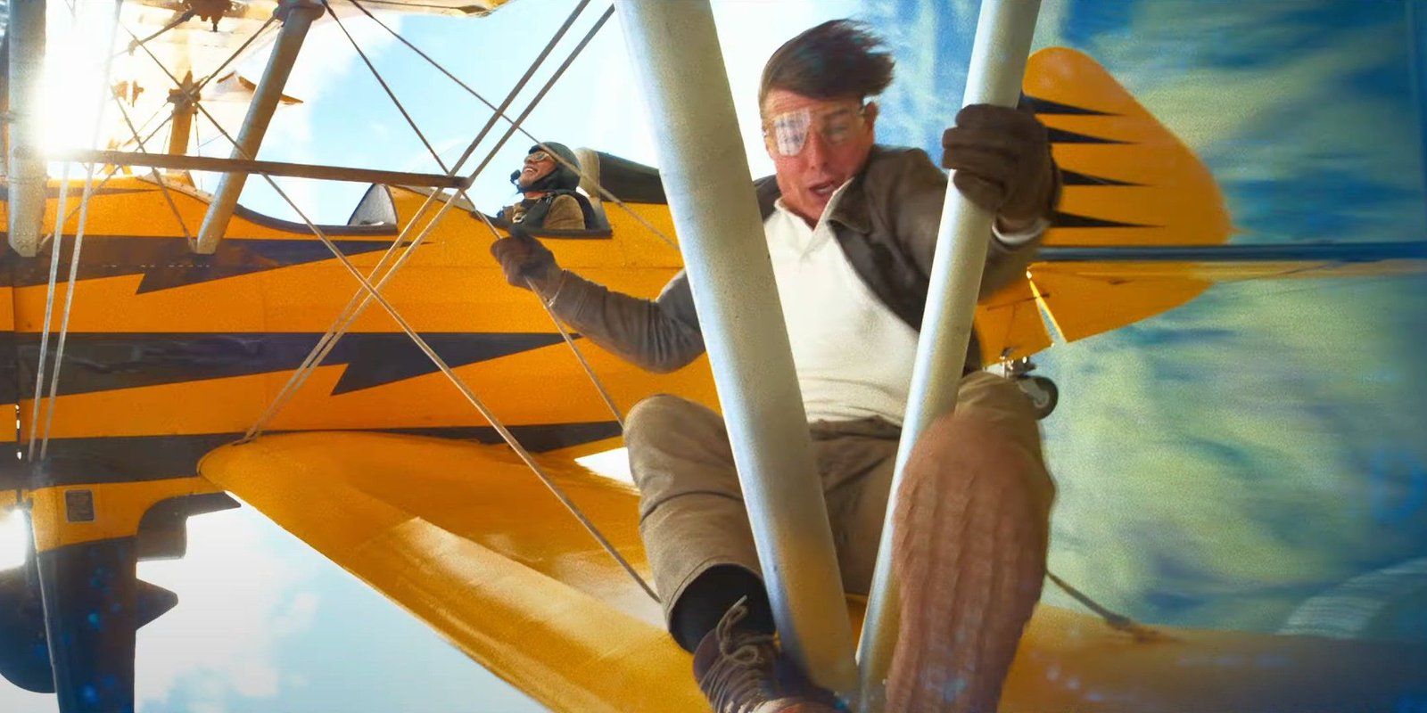 Ethan hanging onto a plane in Mission: Impossible - The Final Reckoning
