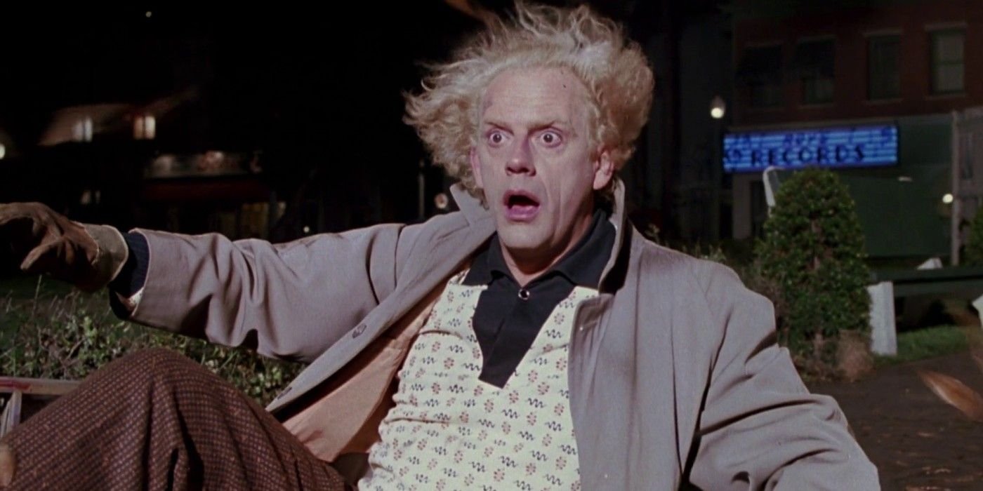 Doc Brown lying on the ground and looking shocked in Back To the Future