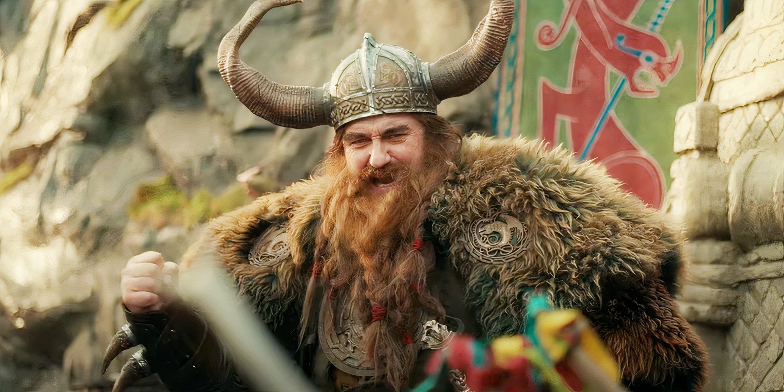 Gerard Butler cheering as Stoic in the live-action How to Train Your Dragon