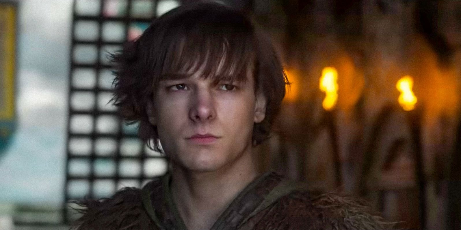 Hiccup (Mason Thames) looking thoughtful in How To Train Your Dragon (2025)