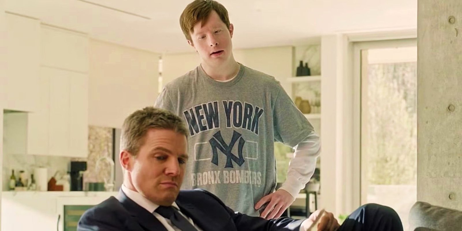 Eddie (Carson A. Egan) and Ted Black (Stephen Amell) in Suits LA.