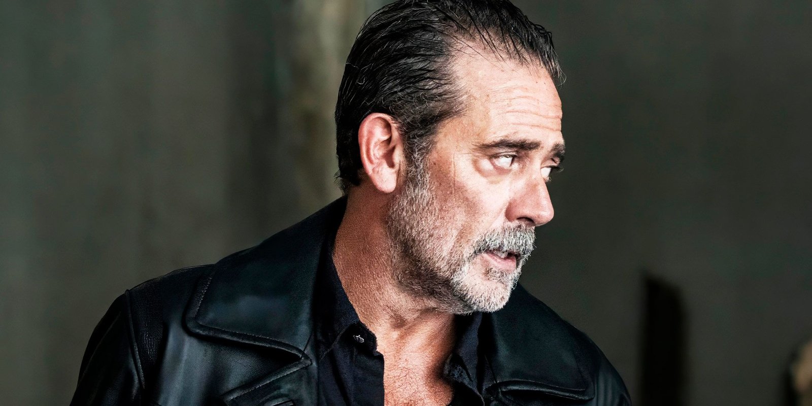 Close-up of Jeffrey Dean Morgan as Negan looking to the side concerned in The Walking Dead: Dead City