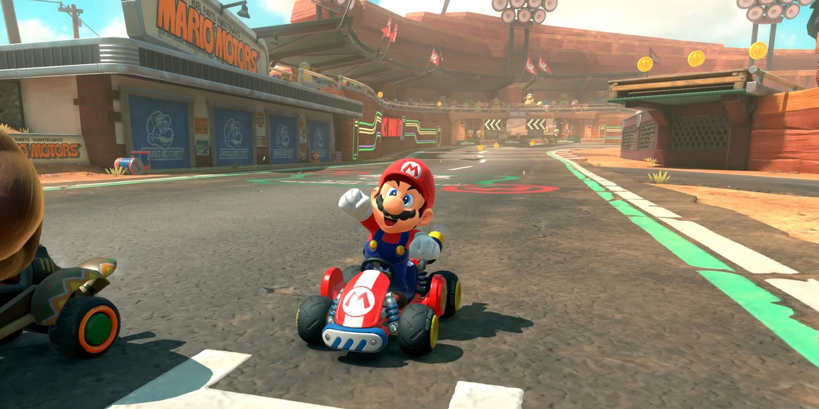 10 Courses In Mario Kart World You'll Want To Check Out ASAP 2 Mario pumping his fist in the Standard Kart in Mario Kart World