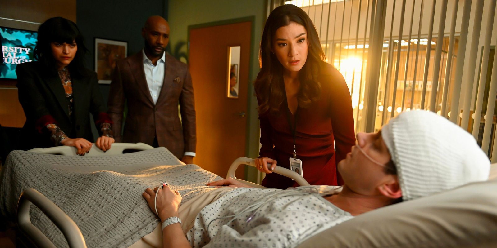 She's A Tough Person To Get Along With 3 Eve Harlow as Dr. Ingrid Derian, Morris Chestnut as Dr. John Watson, Inga Schlingmann as Dr. Sasha Lubbock, and Peter Mark Kendall as Dr. Adam Croft in Watson season 1 finale