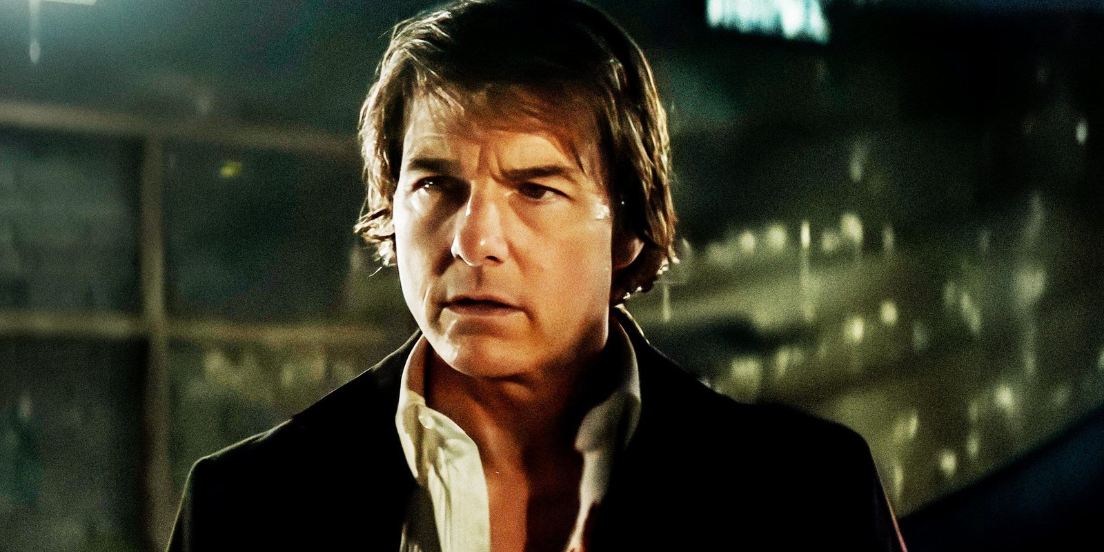 Tom Cruise as Ethan Hunt looking to the side in Mission Impossible The Final Reckoning