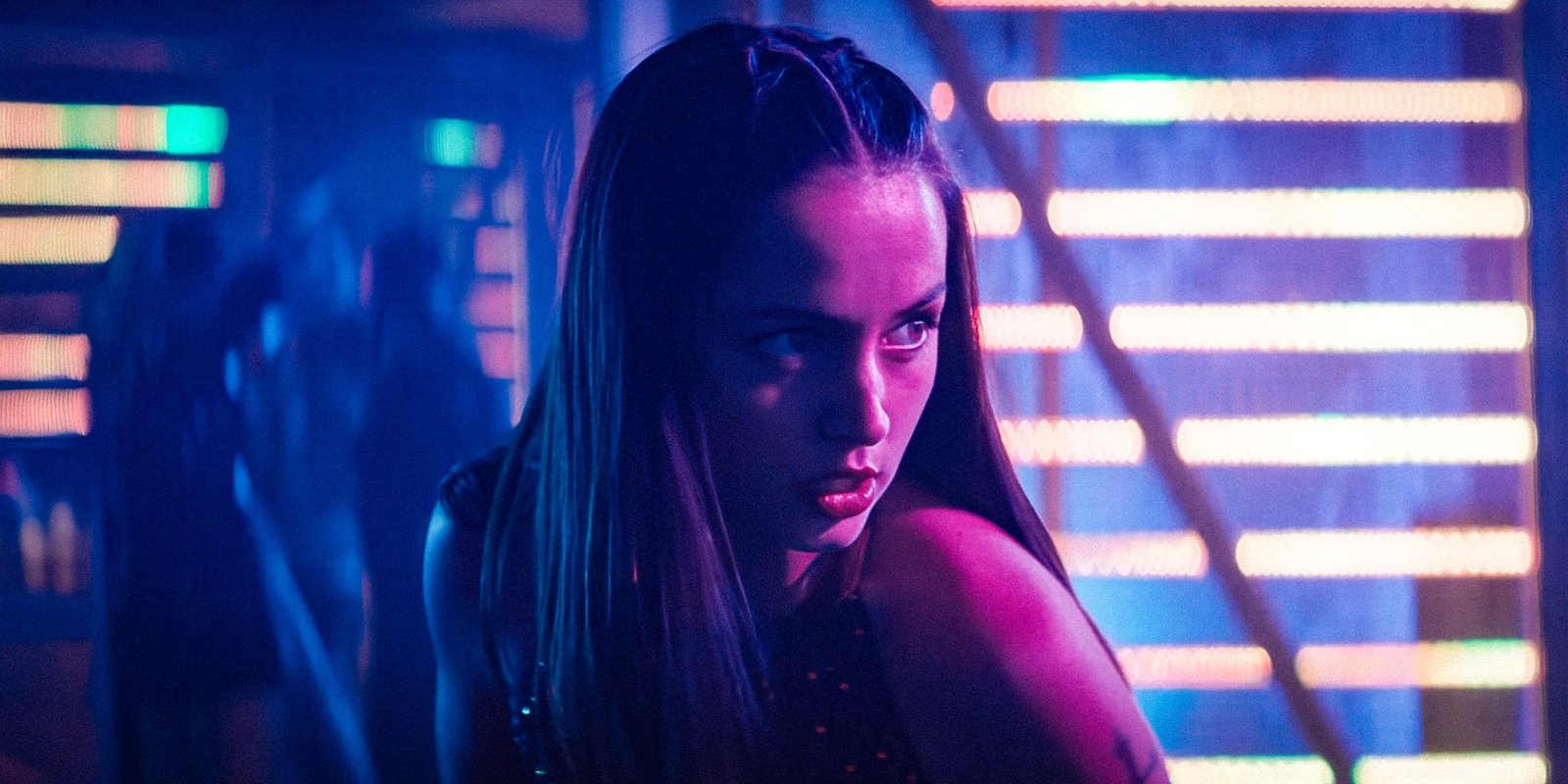 How Eve's Story Connects To John Wick & What It Sets Up 3 Ana de Armas in an action pose at a club in Ballerina