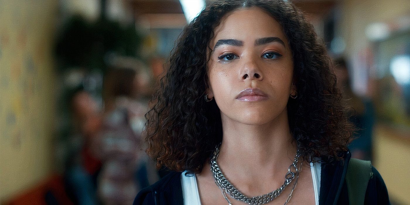 Ginny & Georgia Season 3 EPs Break Down Ginny's Abortion Storyline, Georgia's Trial Shocker, And Much More 3 Ginny In Ginny And Georgia Season 3 walking down the hallway and looking determined