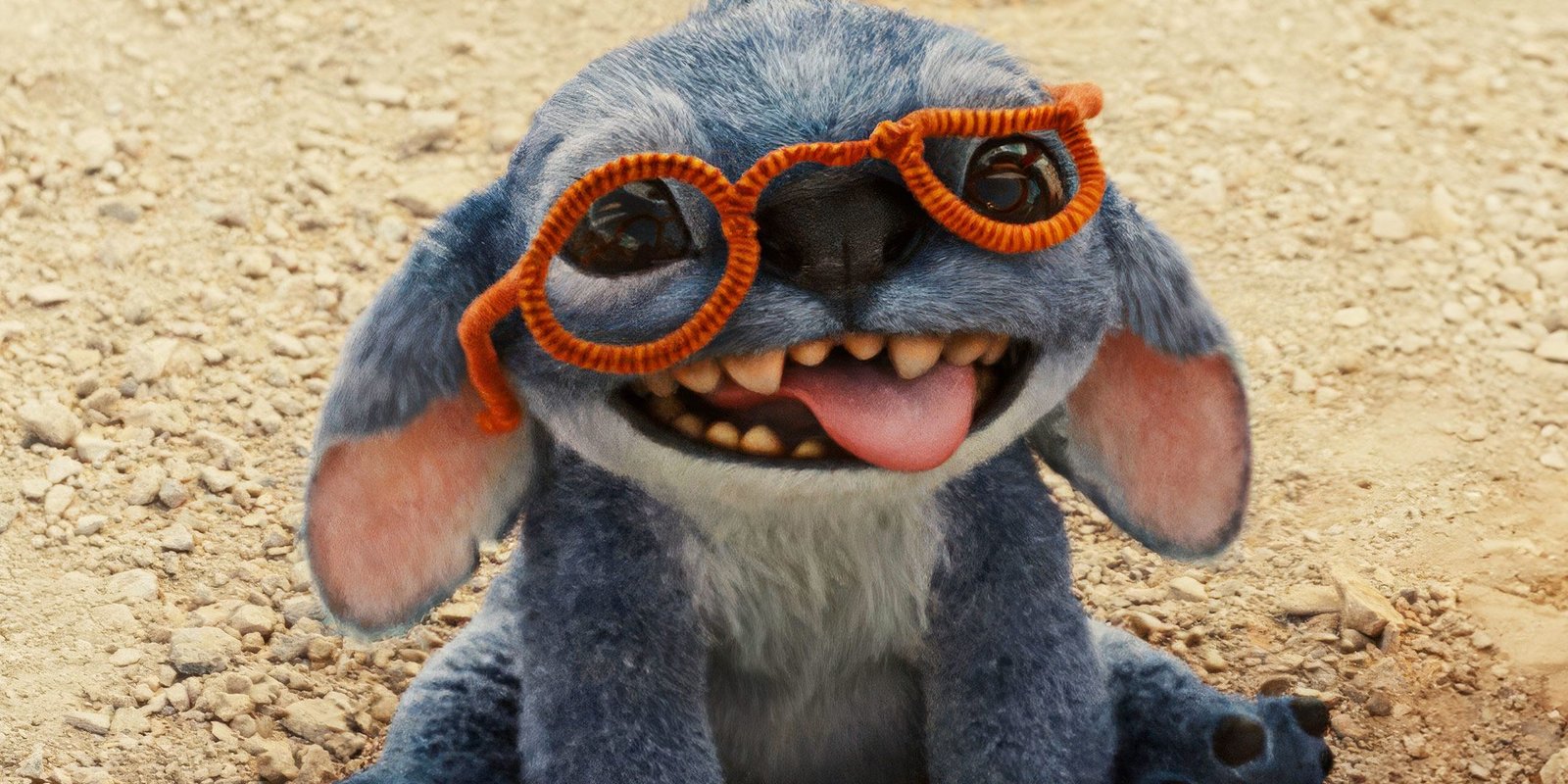Stitch with his tongue out while wearing pipe cleaner glasses in Lilo & Stitch 2025