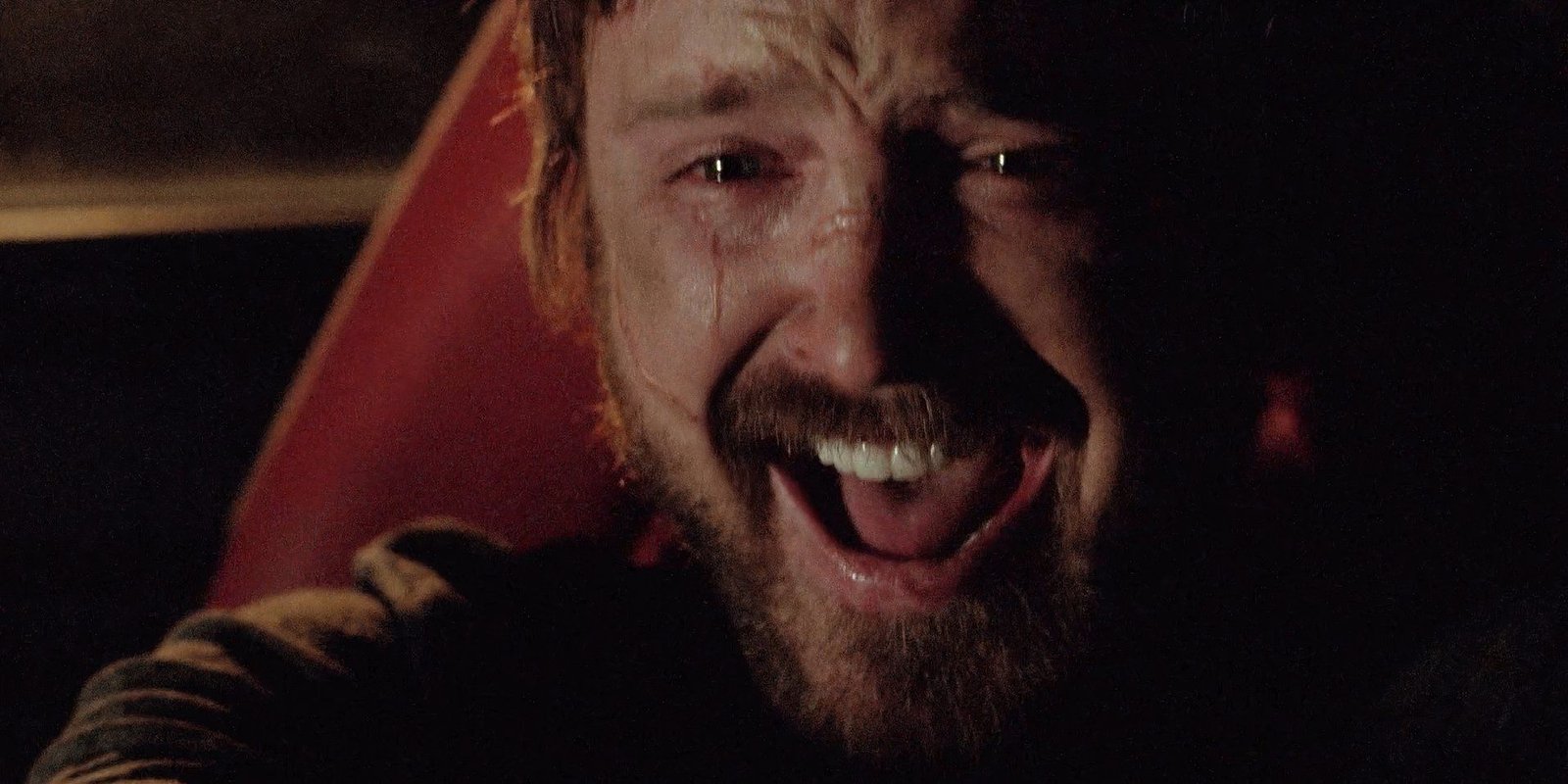 Jesse Pinkman (Aaron Paul) crying, laughing, and smiling in his last scene in Breaking Bad 