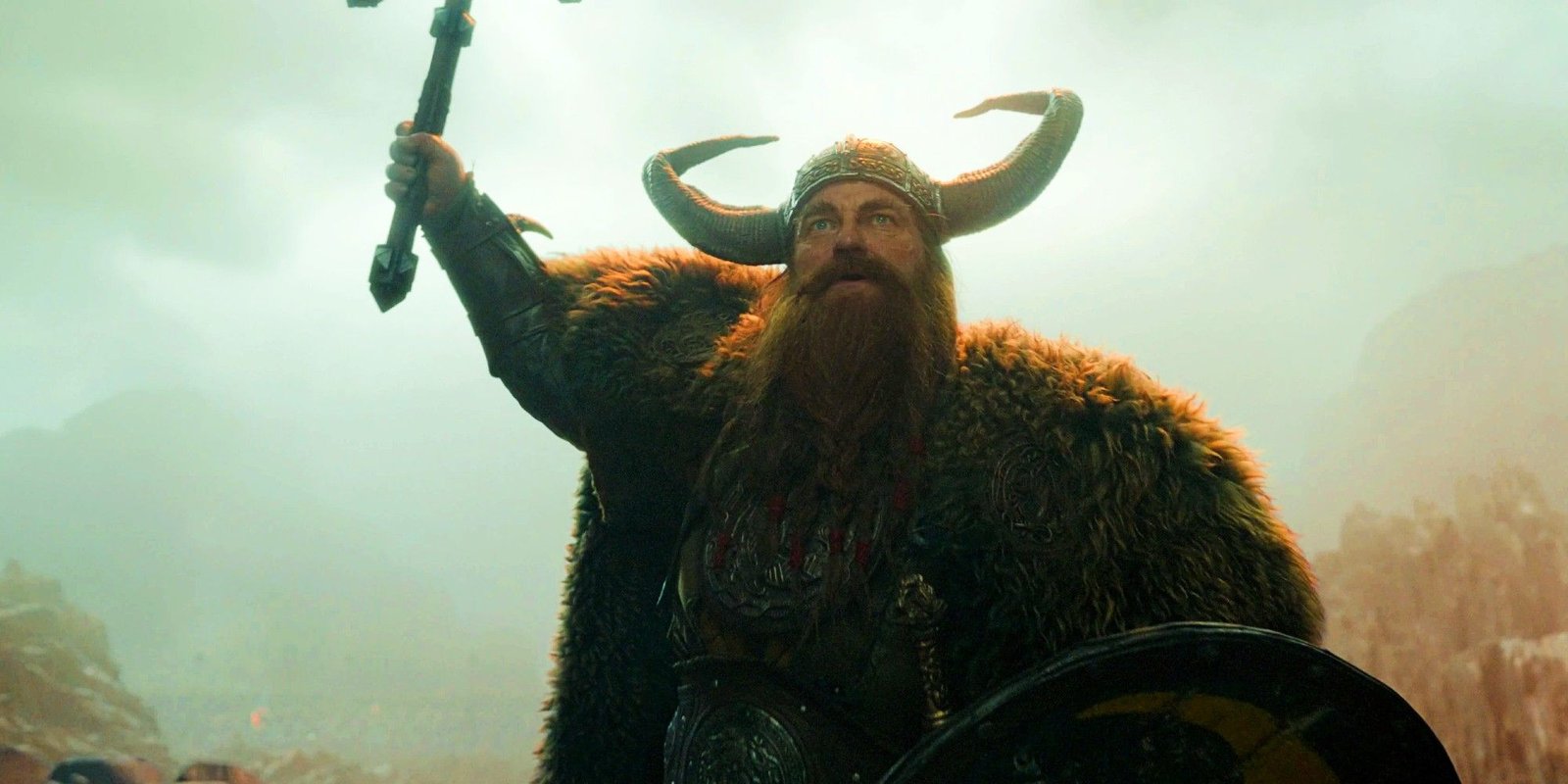 Stoick raises his axe above his head in How to Train Your Dragon live-action movie