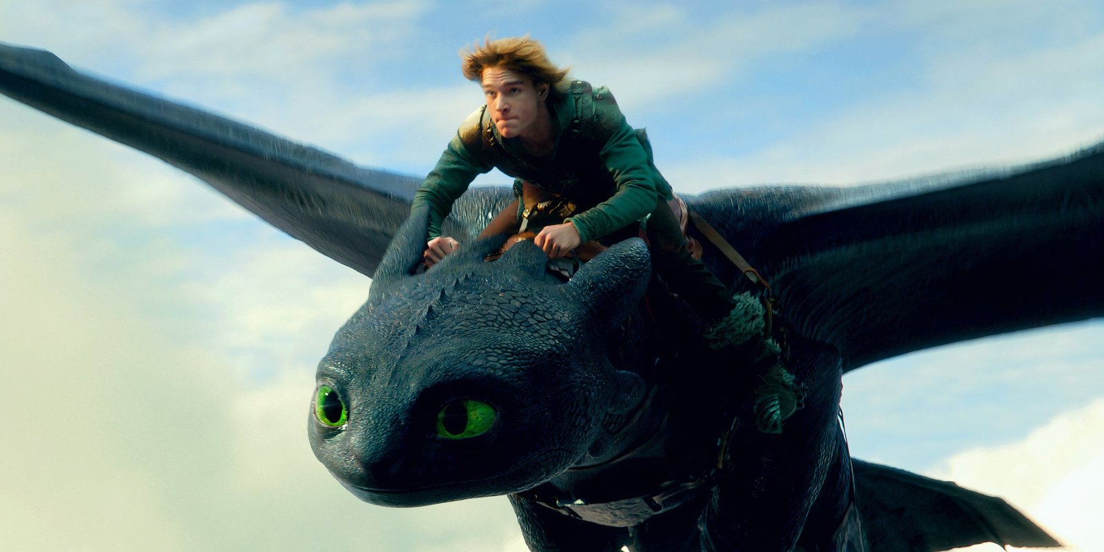 Mason Thames as Hiccup riding Toothless in How To Train Your Dragon 2025