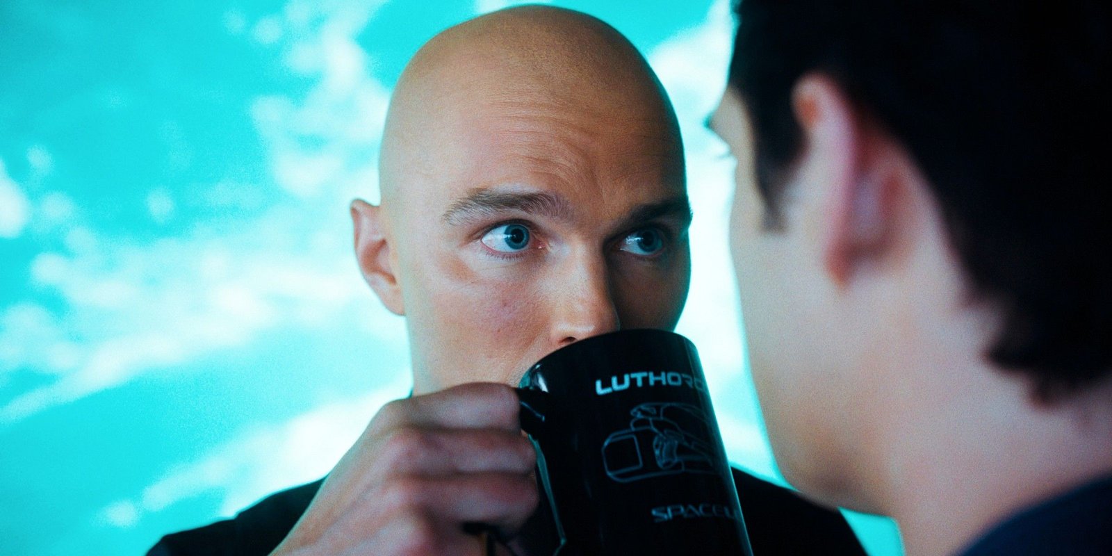 Nicholas Hoult As Lex Luthor Sipping From A Coffee Mug In Superman Face In Superman Trailer