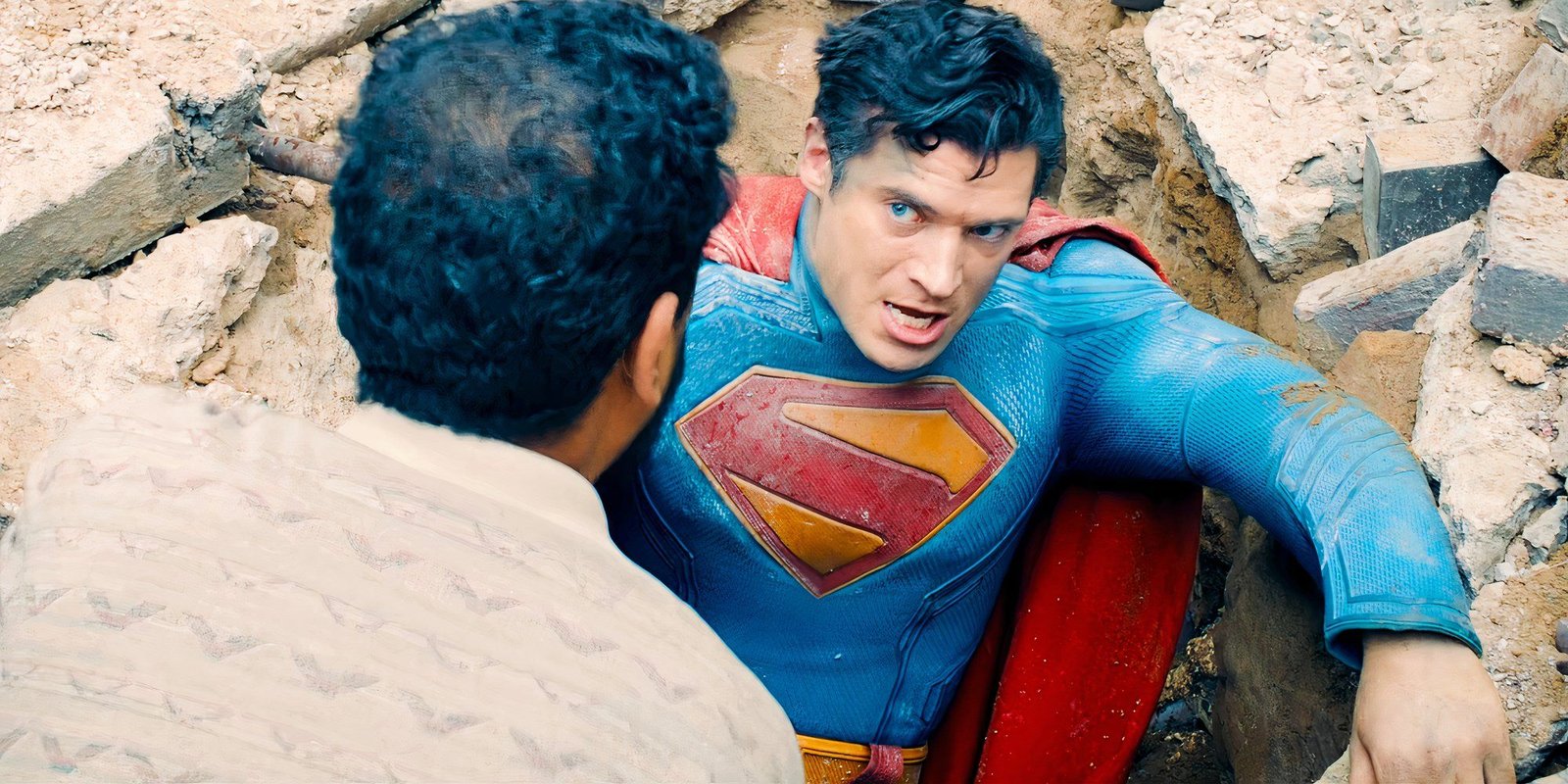 After Watching Superman's Last Trailer, I Need The DCU To Avoid The Most Annoying Superhero Villain Trend Now More Than Ever 2 David Corenswet's Superman getting up from a crater with a citizen's help in the Superman movie trailer
