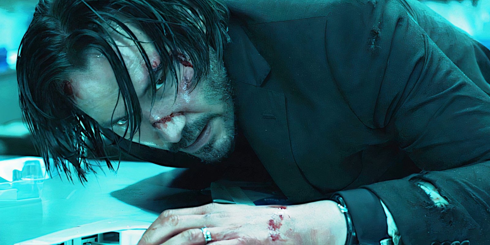 As A Fan Of The Movies, Spine Is As Close As We're Getting To A John Wick Action Game For Now 2 Keanu Reeves glares menacingly in a scene from John Wick