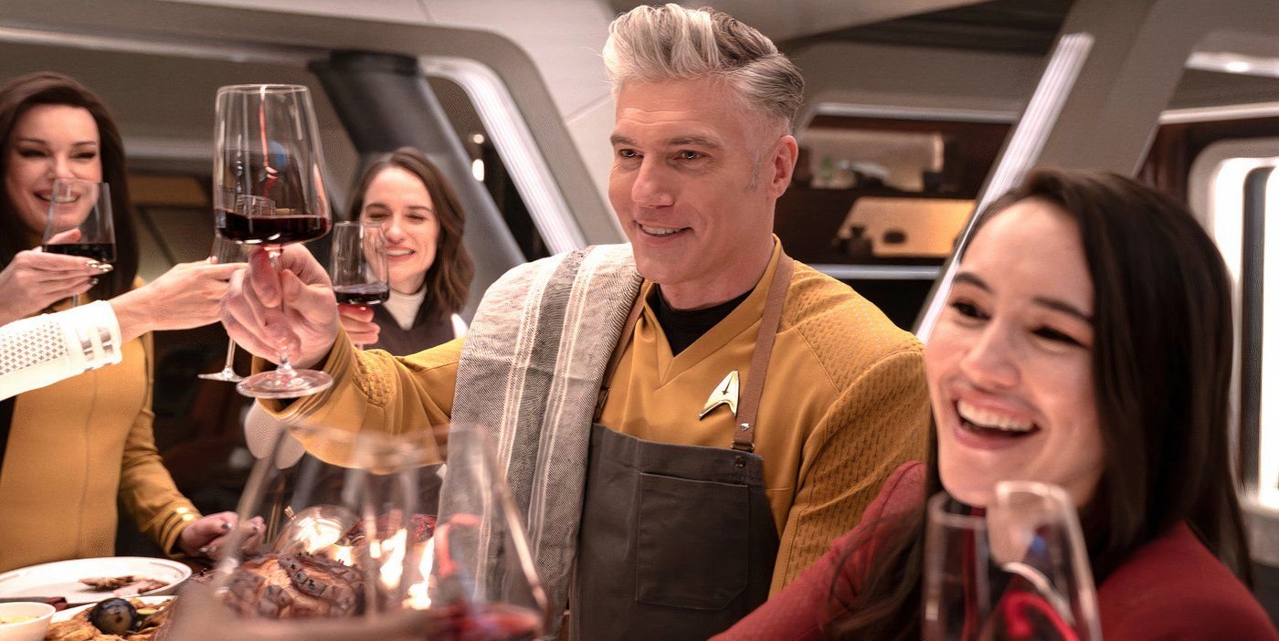 Star Trek’s Anson Mount Reacts To Strange New Worlds Ending After Season 5: “It’s Bittersweet” 2 Captain Pike dinner toast in Star Trek Strange New Worlds season 3