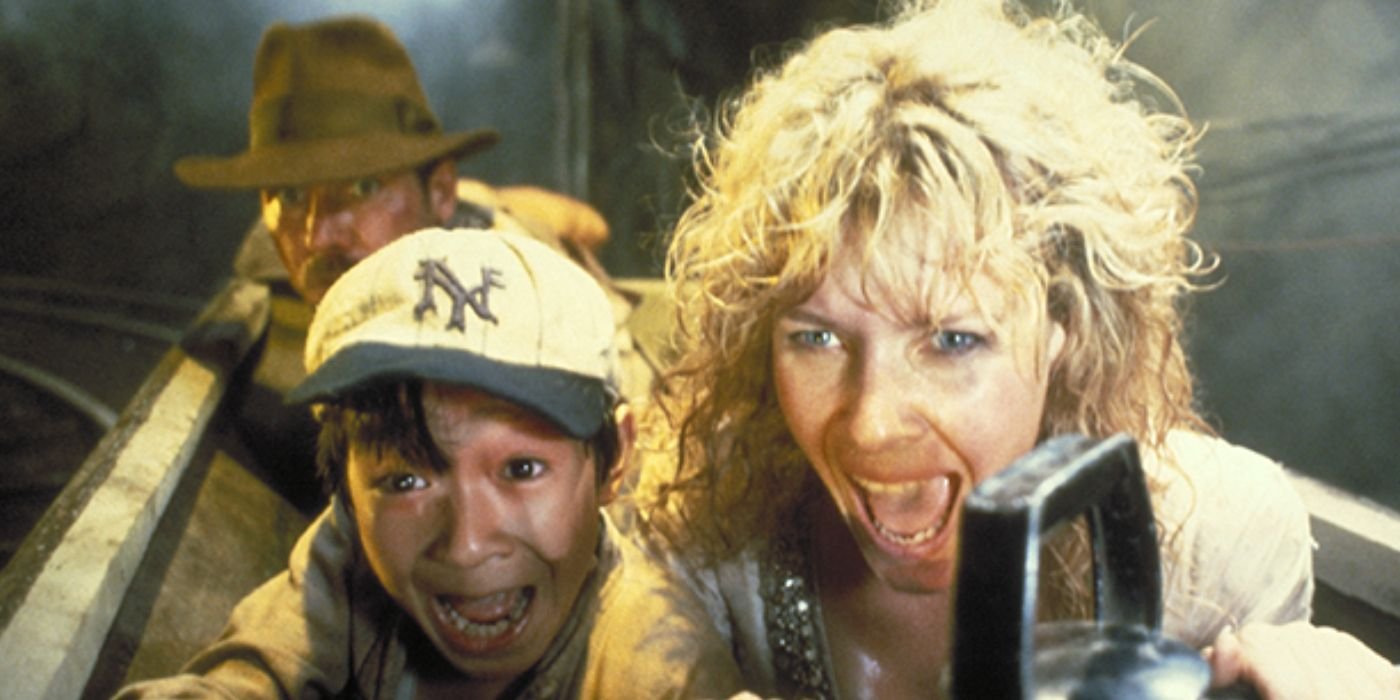 Indy watching Willie and Short Round scream in the minecart in Indiana Jones And The Temple Of Doom 