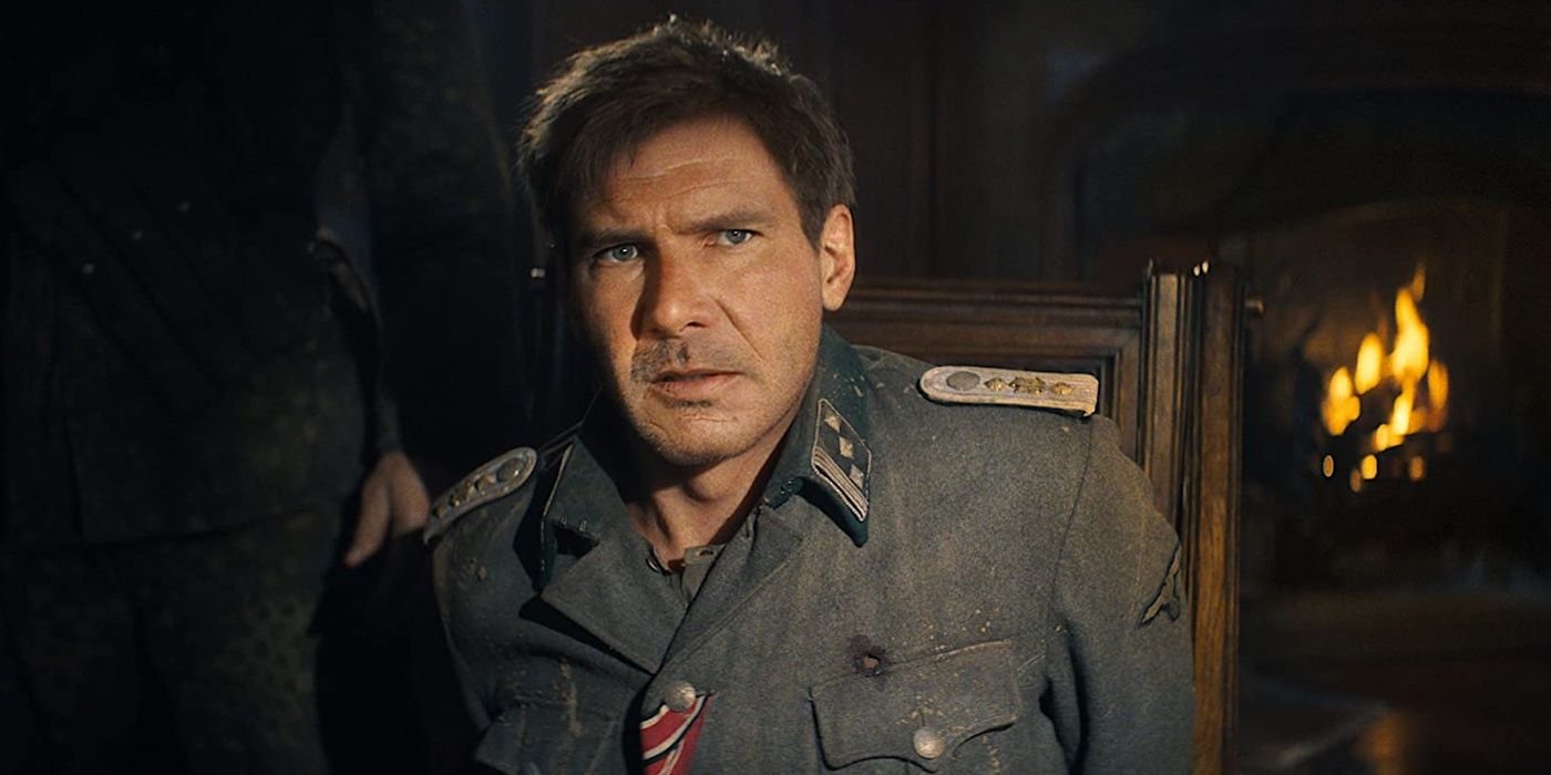 Young Indiana Jones with a stern look on his face in Indiana Jones and the Dial of Destiny.