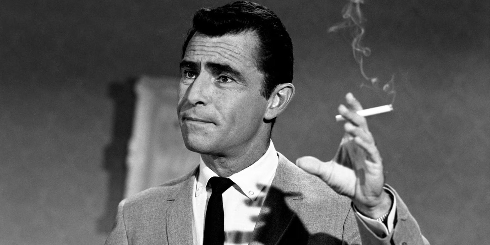 Rod Serling smoking a cigarette in the original version of The Twilight Zone