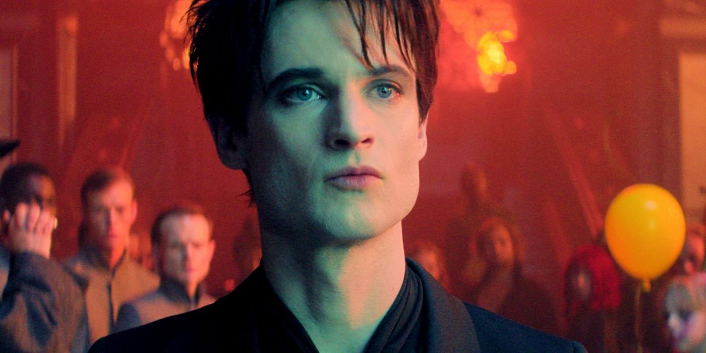 A closeup of Tom Sturridge as Dream at a party in The Sandman season 2