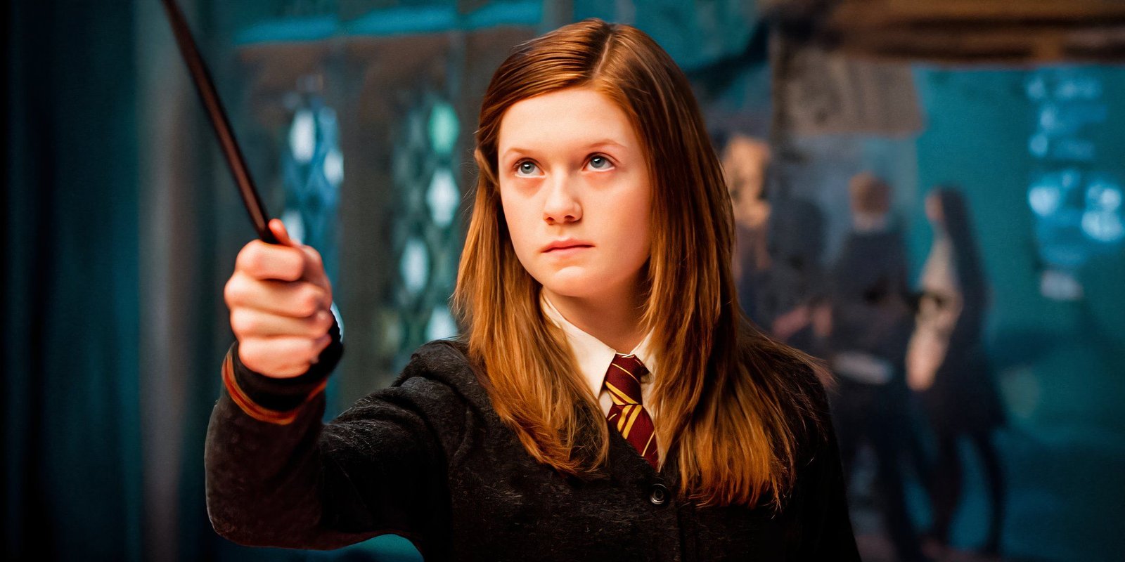 Bonnie Wright as Ginny Weasley in Harry Potter wielding a wand.