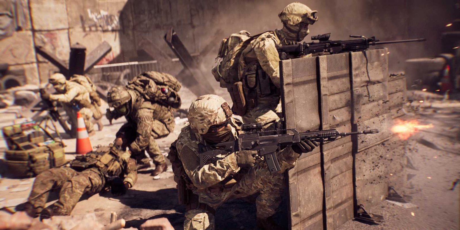 Battlefield 6 soldiers taking cover while another is resuscitated behind them.