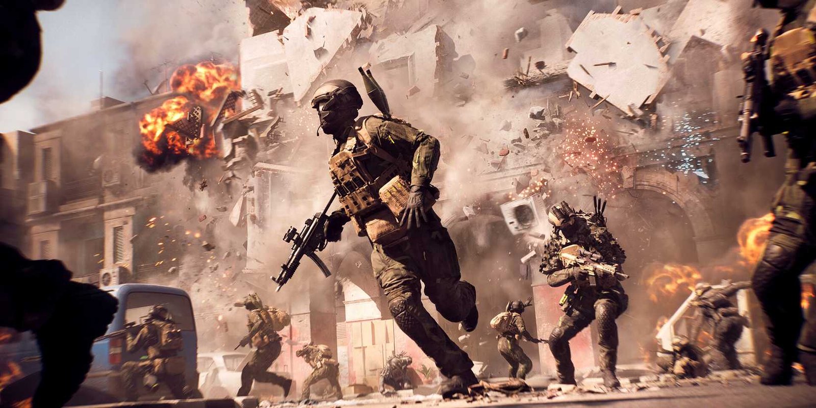 Battlefield 6 soldiers standing near a building that is collapsing.
