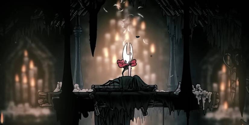 Hollow Knight Silksong's Hornet sticks her sword into the ground.