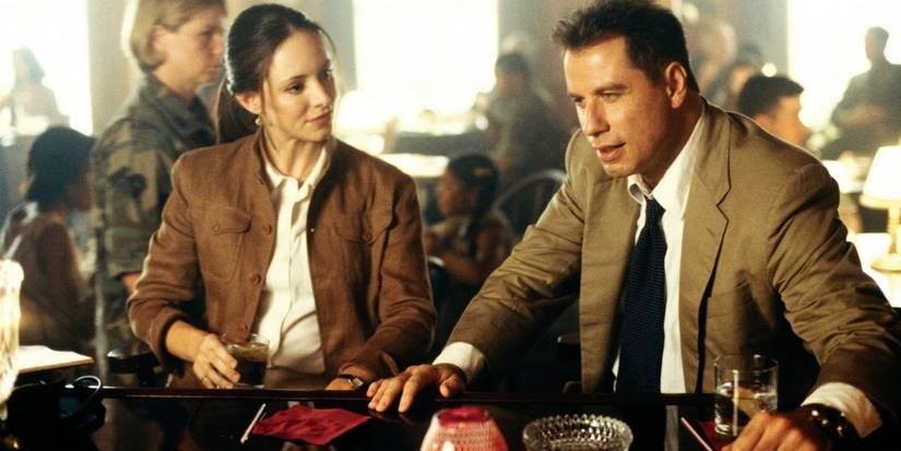 John Travolta and Madeleine Stowe in The General's Daughter