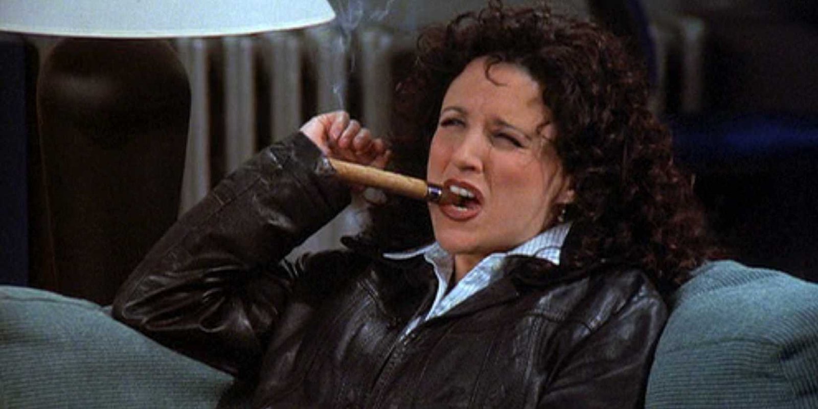 Elaine smoking a cigar in Seinfeld