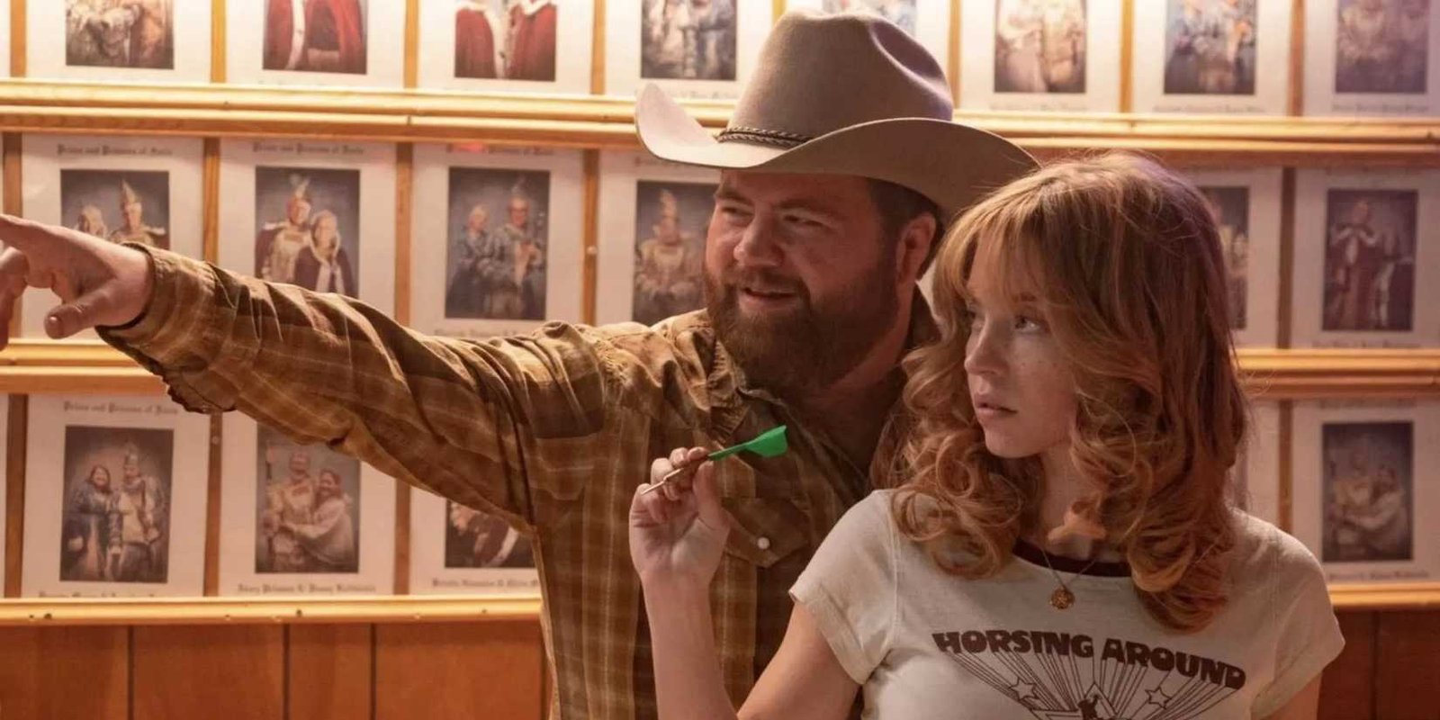 Paul Walter Hauser as Lefty Ledbetter and Sydney Sweeney as Penny Jo Poplin in Americana