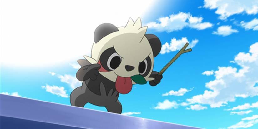 Pancham sticks out its tongue in the Pokemon anime.