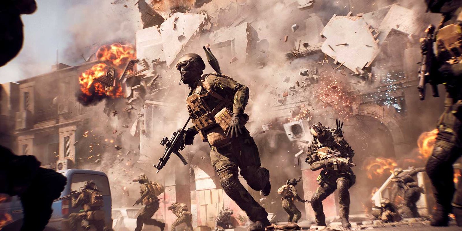 Soldiers running away from an exploding building in Battlefield 6.