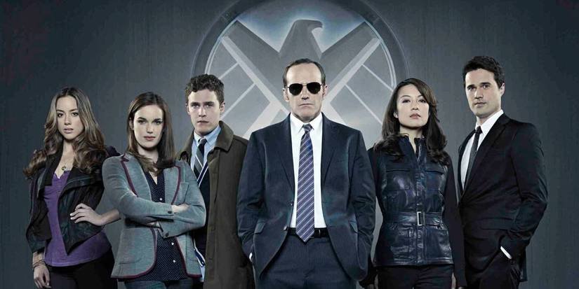 The main characters in Agents of S.H.I.E.L.D. against a grey background with the logo 