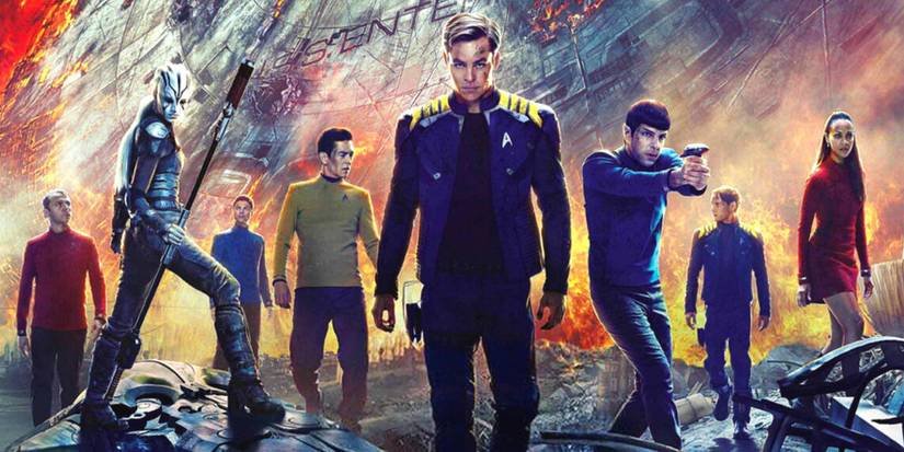 Star Trek Beyond characters in front of the crashed USS Enterprise