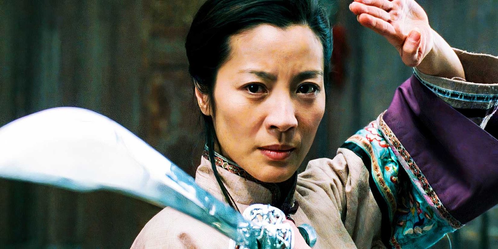 Michelle Yeoh holding a sword in Crouching Tiger, Hidden Dragon