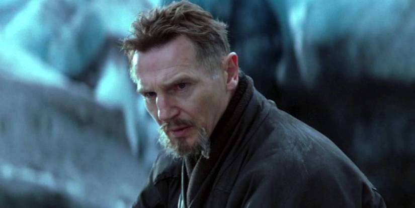 Liam Neeson looking angry as Ra's Al Ghul in Batman Begins.