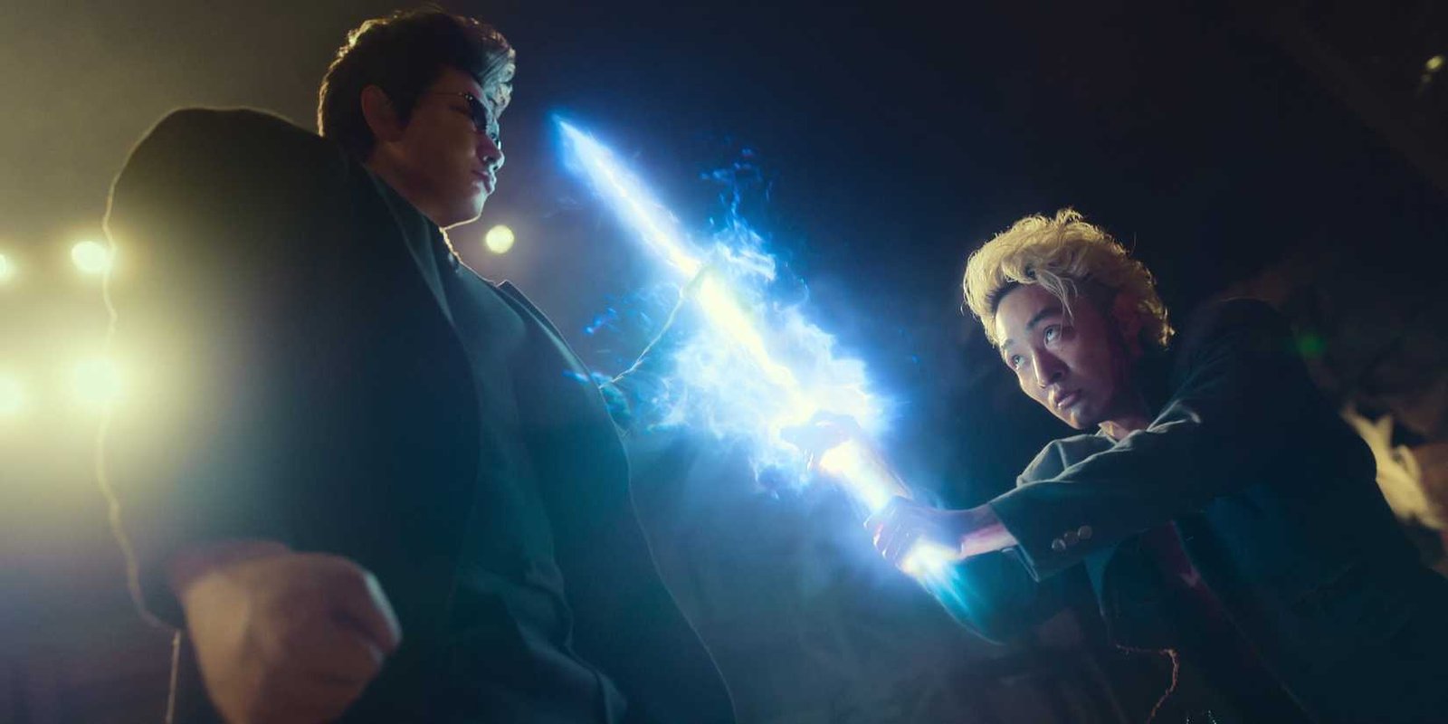 Go Ayano, left, blocking a strike from Shûhei Uesugi 's spirit energy sword in Netflix's Yu Yu Hakusho